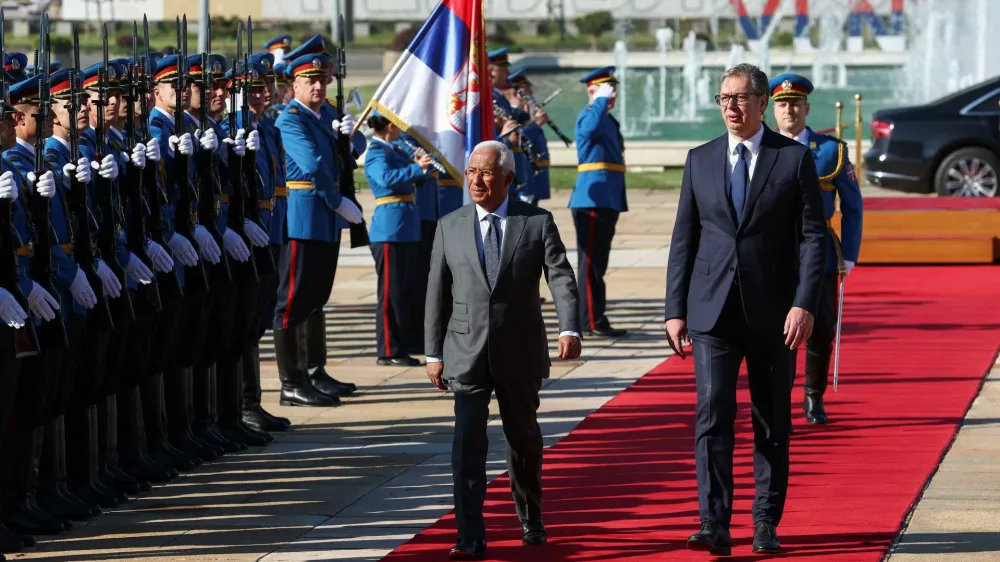 European Council President Antonio Costa reviews an honor guard with Serbian President Aleksandar Vucic as he arrives in Belgrade, Serbia, May 13, 2025. REUTERS/Zorana Jevtic