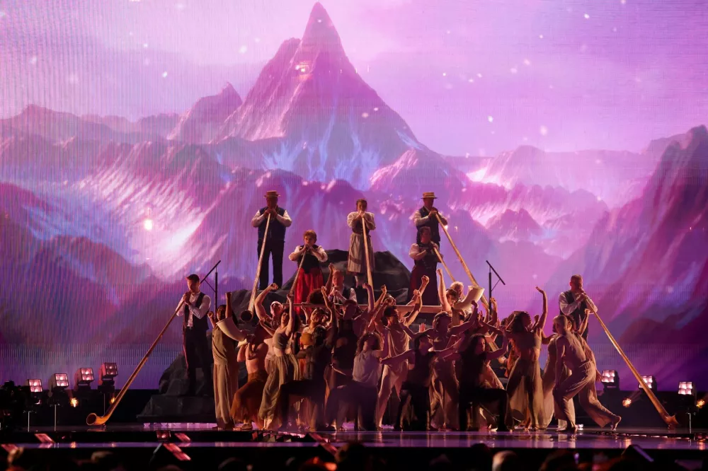 Performers take part in the opening act during the first semi-final of the 2025 Eurovision Song Contest, in Basel, Switzerland, May 13, 2025. REUTERS/Denis Balibouse