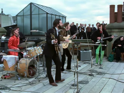2H7X04G The Beatles' rooftop concert. John Lennon, Paul McCartney, George Harrison and Ringo Starr