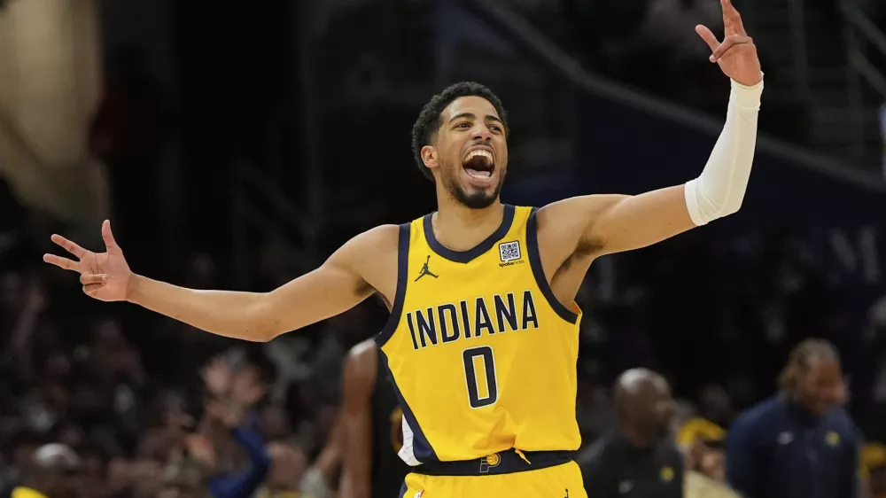 Indiana Pacers guard Tyrese Haliburton celebrates after scoring during the second half in Game 5 of an Eastern Conference semifinal NBA basketball playoff against the Cleveland Cavaliers, Tuesday, May 13, 2025, in Cleveland. (AP Photo/Sue Ogrocki)