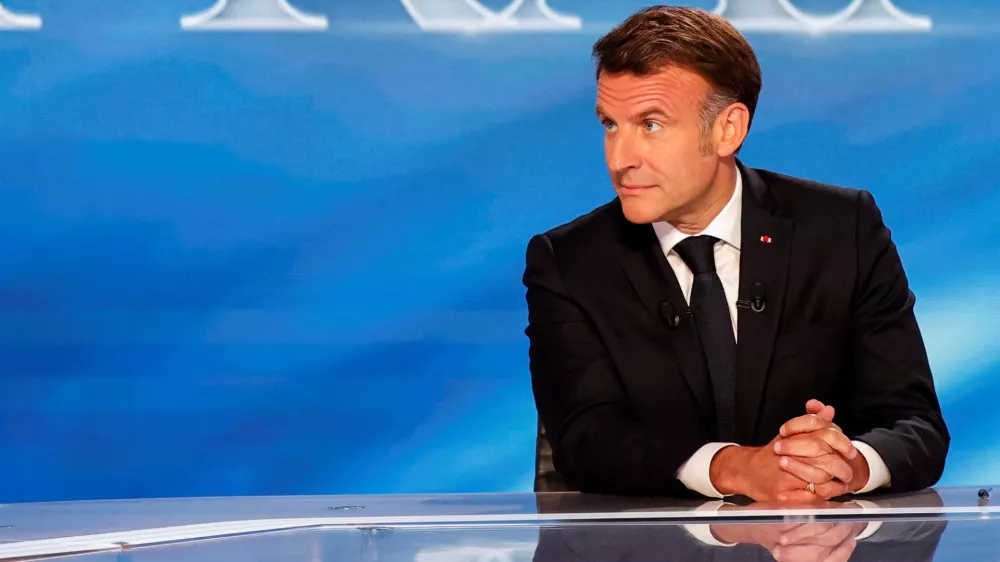 France's President Emmanuel Macron looks on as he attends a special program of the French channel TF1 in Saint-Denis, north of Paris, France, May 13, 2025. LUDOVIC MARIN/Pool via REUTERS