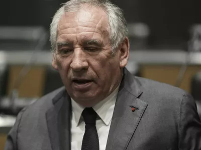 French Prime Minister Francois Bayrou arrives to face questions from a parliamentary inquiry into alleged abuse at a Catholic school amid accusations he has hidden what he knows about the scandal, in Paris, Wednesday May 14, 2025. (AP Photo/Aurelien Morissard)