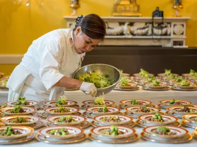 White House Executive Chef Cris Comerford prepares dishes of Quinoa Black Bean and Corn Salad for the Epicurious Kids? State Dinner in the Old Family Dining Room of the White House, Aug. 20, 2012. (Official White House Photo by Sonya N. Hebert)This official White House photograph is being made available only for publication by news organizations and/or for personal use printing by the subject(s) of the photograph. The photograph may not be manipulated in any way and may not be used in commercial or political materials, advertisements, emails, products, promotions that in any way suggests approval or endorsement of the President, the First Family, or the White House.