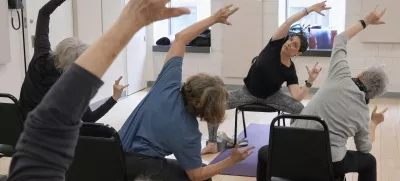 Whitney Chapman, right, conducts a chair yoga class at the Marlene Meyerson JCC Manhattan, in New York, March 28, 2025. (AP Photo/Richard Drew)