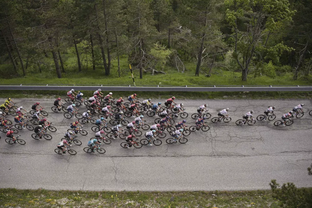 The pack rides during the stage 8 of the Giro d'Italia from Giulianova to Castelraimondo, Italy on Saturday, May 17, 2025. (Marco Alpozzi/LaPresse via AP)