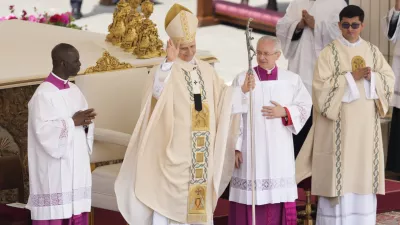 Pope Leo XIV waves at the end of a Mass for the formal inauguration of his pontificate, in St. Peter's Square, at the Vatican, Sunday, May 18, 2025.(AP Photo/Gregorio Borgia)