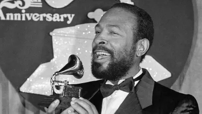 Marvin Gaye kisses his Grammy Award after he was named top Rhythm & Blues Male Vocalist at the 25th annual Grammy Awards presentation, Wednesday, Feb. 24, 1983, Los Angeles, Calif. Gaye received two Grammys for Best R & B Instrumental Performance and R & B Male Vocalist for his hit song Sexual Healing. (AP Photo)
