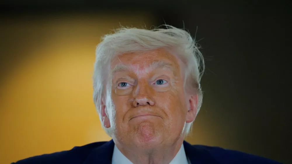 U.S. President Donald Trump reacts as he visits the Abrahamic Family House during his visit in Abu Dhabi, United Arab Emirates, May 16, 2025. REUTERS/Brian Snyder