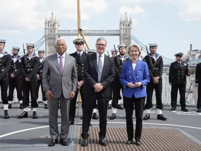 European Council President Antonio Costa, Britain's Prime Minister Keir Starmer and President of the European Commission Ursula von der Leyen stand with members of the Royal Navy on board Type 23 frigate HMS Sutherland in central London, following the UK-EU Summit. Picture date: Monday May 19, 2025. Stefan Rousseau/Pool via REUTERS