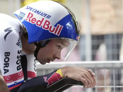 Slovenia's Primoz Roglic of Red Bull competes during the 10th stage of the Giro d'Italia cycling race, an individual time trial from Lucca to Pisa, Italy, Tuesday, May 20, 2025. (Massimo Paolone/LaPresse via AP)