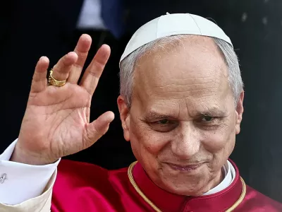 Pope Leo XIV waves as he leaves the basilica of Saint Paul Outside the Walls, in Rome, Italy, May 20, 2025. REUTERS/Yara Nardi
