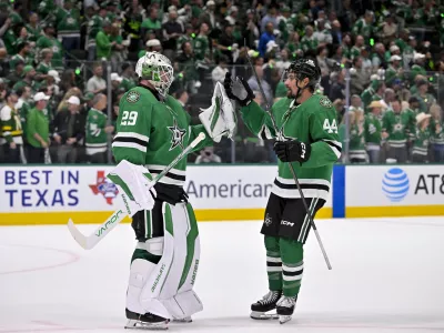 May 21, 2025; Dallas, Texas, USA; Dallas Stars goaltender Jake Oettinger (29) and defenseman Cody Ceci (44) celebrate after the Stars defeat the Edmonton Oilers in game one of the Western Conference Final of the 2025 Stanley Cup Playoffs at American Airlines Center. Mandatory Credit: Jerome Miron-Imagn Images