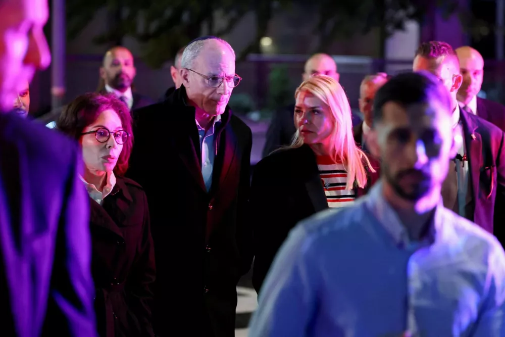 U.S. Attorney General Pam Bondi and Israeli Ambassador to the U.S. Yechiel Leiter visit the site where, according to the U.S. Homeland Security Secretary, two Israeli embassy staff were shot dead near the Capital Jewish Museum in Washington, D.C., U.S. May 22, 2025. REUTERS/Jonathan Ernst