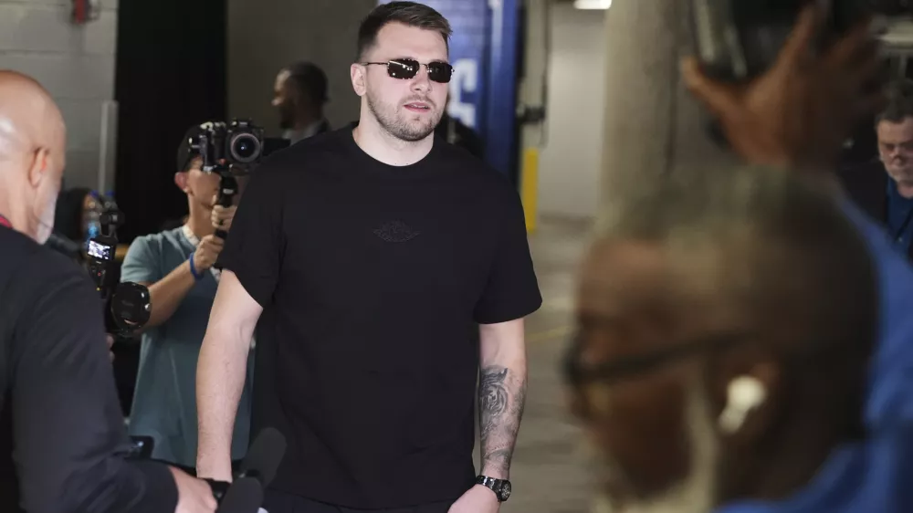 Los Angeles Lakers' Luka Doncic arrives at American Airlines Center for an NBA basketball game against the Dallas Mavericks in Dallas, Wednesday, April 9, 2025. (AP Photo/LM Otero)