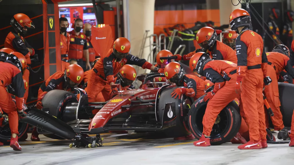 Ferrari driver Charles Leclerc of Monaco makes a pit stop during the Formula One Bahrain Grand Prix it in Sakhir, Bahrain, Sunday, March 20, 2022. (Giuseppe Cacace, Pool via AP)