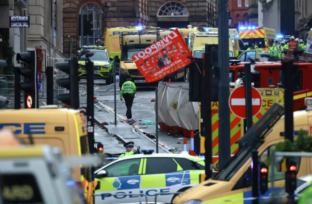 Soccer Football - Premier League - Liverpool Victory Parade - Liverpool, Britain - May 26, 2025 Emergency services at the scene after multiple people were hit by a car during the Victory parade REUTERS/Phil Noble   TPX IMAGES OF THE DAY