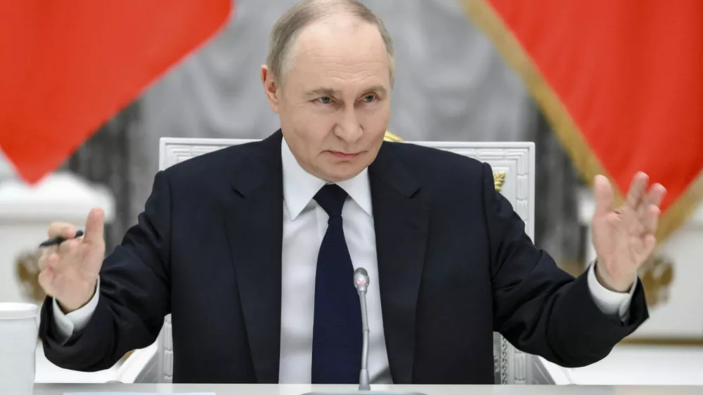 Russian President Vladimir Putin holds a meeting with members of Russia's business community at the Kremlin in Moscow, Russia, Monday, May 26, 2025. (Grigory Sysoyev, Sputnik, Kremlin Pool Photo via AP)