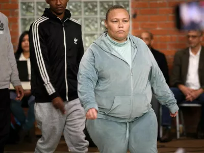 Kelly Smith, the mother of Joshlin Smith, arrives for the sentencing hearing at the Western Cape High Court in Saldanha Bay, South Africa, May 29, 2025. A South African judge sentenced Smith and her two accomplices after they were found guilty of kidnapping and trafficking Smith's six-year-old daughter, Joshlin Smith. REUTERS/Sumaya Hisham