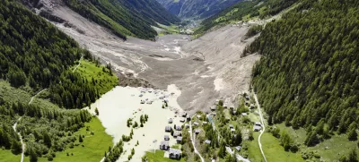 An aerial view shows the destruction of Blatten, Switzerland, Thursday, May 29, 2025, one day after a massive debris avalanche, triggered by the collapse of the Birch Glacier, swept down to the valley floor and demolished large parts of the village. (Jean-Christophe Bott/Keystone via AP)
