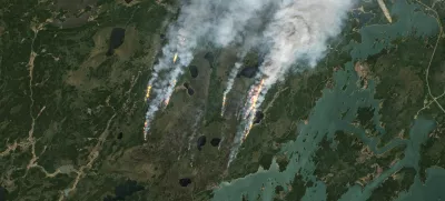 A satellite image shows smoke rising from wildfires in Manitoba, Canada, May 27, 2025. European Union/Copernicus Sentinel-2/Handout via REUTERS  THIS IMAGE HAS BEEN SUPPLIED BY A THIRD PARTY. MANDATORY CREDIT. NO RESALES. NO ARCHIVES. PICTURES HAVE BEEN ENHANCED FROM THE SOURCE TO VISUALISE THE INFRARED EMISSIONS OF THE ACTIVE FIRES.