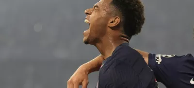PSG's Desire Doue celebrates after scoring his side's second goal against Inter Milan during the Champions League final soccer match at the Allianz Arena in Munich, Germany, May 31, 2025. (AP Photo/Matthias Schrader)