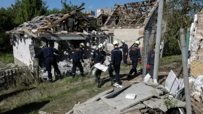 Emergency workers remove debris from a private house that was damaged in a Russian drone strike, amid Russia's attack on Ukraine, in Zaporizhzhia, Ukraine, June 1, 2025. REUTERS/Thomas Peter