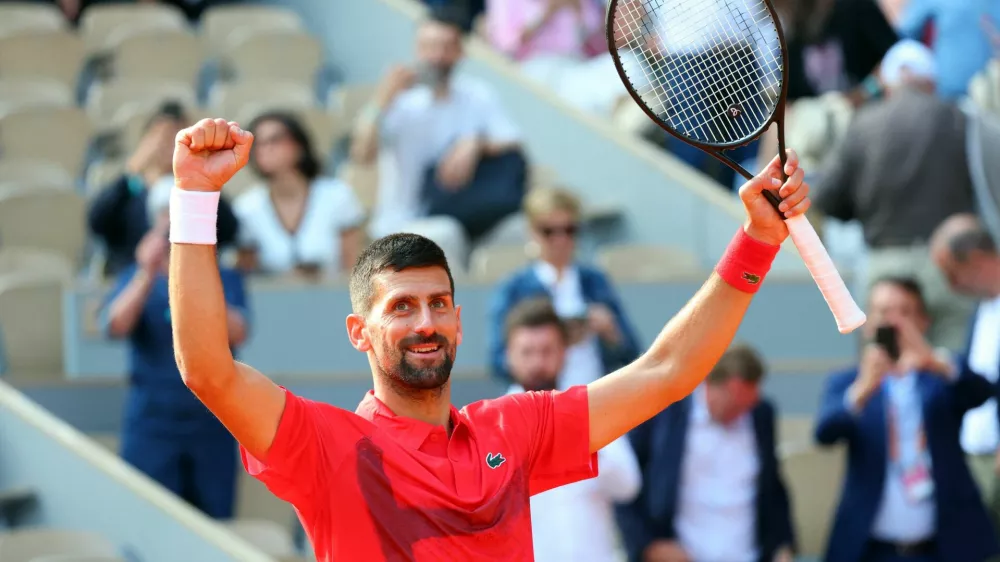Tennis - French Open - Roland Garros, Paris, France - June 2, 2025 Serbia's Novak Djokovic celebrates winning his fourth round match against Britain's Cameron Norrie REUTERS/Denis Balibouse