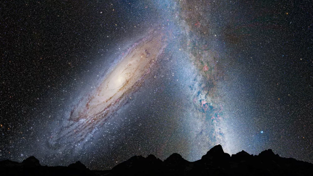 Simbolična. An illustration shows a stage in the potential merger between the Milky Way galaxy and the neighboring Andromeda galaxy, as viewed in Earth's night sky in 3.75 billion years. Andromeda (left) fills the field of view and begins to distort the Milky Way (right) with tidal pull, in this image released by NASA on May 31, 2012. NASA/ESA/Z. Levay and R. van der Marel/ STScI/ T. Hallas and A. Mellinger/Handout via REUTERS/Illustration THIS IMAGE HAS BEEN SUPPLIED BY A THIRD PARTY