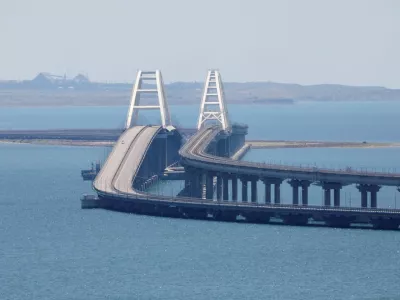 FILE PHOTO: A view shows the Crimean Bridge, a section of which was damaged by an alleged overnight attack, as seen form the city of Kerch, Crimea, July 17, 2023. REUTERS/Alexey Pavlishak/File Photo