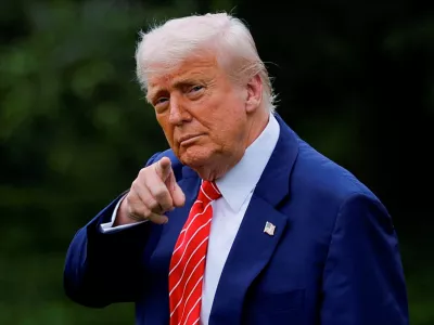 FILE PHOTO: U.S. President Donald Trump gestures, as he departs for Pennsylvania, on the South Lawn of the White House in Washington, D.C., U.S., May 30, 2025. REUTERS/Kent Nishimura/File Photo