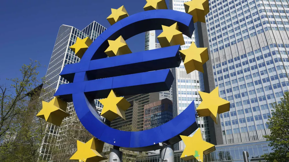 FILE - A view of the European currency Euro sculpture, at Germany's main financial district in Frankfurt, Germany, Wednesday, April 9, 2025. (AP Photo/Martin Meissner, File)