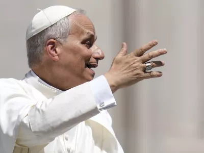 Pope Leo XIV gestures as he leaves after his weekly general audience in St. Peter's Square at The Vatican, Wednesday, June 4, 2025. (AP Photo/Gregorio Borgia)