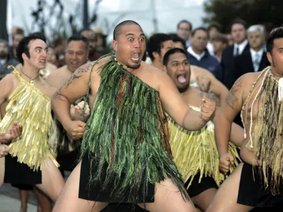 Maori warriors from New Zealand dance at Aquatic Park after paddling ashore at dawn in San Francisco, Thursday, Aug. 4, 2005. The Maori made the visit to kick off the opening of one of the largest collections of Maori art to be shown in the U.S. at San Francisco's Yerba Buena Center for the Arts and to encourage Americans to visit the Pacific island nation.(AP Photo/Eric Risberg)