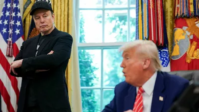 FILE PHOTO: U.S. President Donald Trump and Elon Musk attend a press conference in the Oval Office of the White House in Washington, D.C., U.S., May 30, 2025. REUTERS/Nathan Howard/File Photo