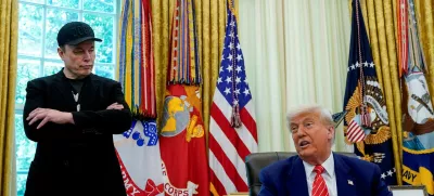 FILE PHOTO: U.S. President Donald Trump and Elon Musk attend a press conference in the Oval Office of the White House in Washington, D.C., U.S., May 30, 2025. REUTERS/Nathan Howard/File Photo
