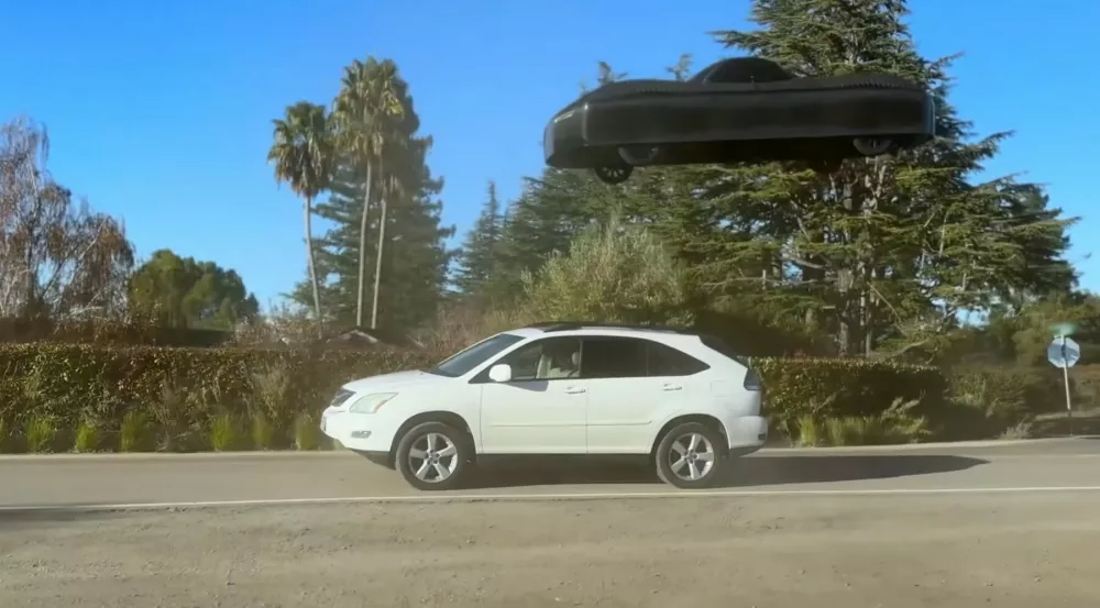 **VIDEO AVAILABLE. CONTACT INFO@COVERMG.COM TO RECEIVE.**A futuristic flying car has successfully flown over another vehicle during a test in the United States, marking a major milestone for airborne transportation. US startup Alef Aeronautics has released footage of its Model Zero prototype taking off and soaring over a parked car on a public road in California - a first-of-its-kind demonstration outside of a controlled test environment. "This drive and flight test represents an important proof of technology in a real-world city environment," said Alef Aeronautics chief executive Jim Dukhovny. "We hope it will be a moment similar to the Wright Brothers' Kitty Hawk video, proving to humanity that new transportation is possible." Unlike most flying car prototypes, which resemble quadcopter drones with external rotor blades or require fold-down wings for takeoff, the Alef Model Zero maintains a conventional car design while concealing its rotors within the chassis. The company has revealed that its fully electric vehicle will have a driving range of 320 kilometres and a flight range of approximately 160km. Founded in 2015, Alef Aeronautics aims to develop an affordable flying vehicle for the masses, rather than just a luxury product for the wealthy. So far, the startup has secured more than 3,300 pre-orders for its Model A, which is set to enter production later this year. A manufacturing deal has already been signed with PUCARA Aero and MYC, a partnership known for producing aviation-grade parts for Airbus and Boeing. With a starting price of around $300,000 (&pound;237,000), the Model A is the company's first commercial flying car. However, Alef is also working on a more affordable Model Z, expected to be priced at around $35,000. "Designed to drive on the street, take off vertically when needed and fly overhead above traffic, we're building the solution to the issues of modern congestion," the company states on its website. "It fits into a regular driving lane and conforms to all traffic regulatory conditions. Alef flying car fits into a regular parking space and inside a regular-sized garage."When: 06 Mar 2025Credit: Alef Aeronautics Inc./INSTARimages**EDITORIAL USE ONLY. MATERIALS ONLY TO BE USED IN CONJUNCTION WITH EDITORIAL STORY. THE USE OF THESE MATERIALS FOR ADVERTISING, MARKETING OR ANY OTHER COMMERCIAL PURPOSE IS STRICTLY PROHIBITED. MATERIAL COPYRIGHT REMAINS WITH STATED PHOTOGRAPHER AND/OR SUPPLIER.**,Image: 972862289, License: Rights-managed, Restrictions: EDITORIAL USE ONLY. MATERIALS ONLY TO BE USED IN CONJUNCTION WITH EDITORIAL STORY. THE USE OF THESE MATERIALS FOR ADVERTISING, MARKETING OR ANY OTHER COMMERCIAL PURPOSE IS STRICTLY PROHIBITED. MATERIAL COPYRIGHT REMAINS WITH STATED PHOTOGRAPHER AND/OR SUPP, Model Release: no