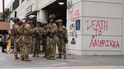U.S. National Guard are deployed around downtown Los Angeles, Sunday, June 8, 2025, following a immigration raid protest the night before. (AP Photo/Eric Thayer)
