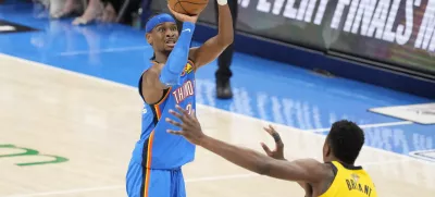 Jun 8, 2025; Oklahoma City, Oklahoma, USA; Oklahoma City Thunder guard Shai Gilgeous-Alexander (2) shoots the ball against Indiana Pacers center Thomas Bryant (3) during the second half during game two of the 2025 NBA Finals at Paycom Center. Mandatory Credit: Kyle Terada-Imagn Images