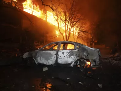 Firefighters tackle a blaze after a Russian attack that hit a residential building in Kharkiv, Ukraine, Wednesday, June 11, 2025. (AP Photo/Andrii Marienko)