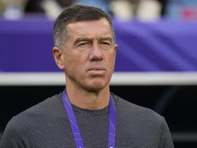 FILE - Uzbekistan's head coach Srecko Katanec looks from the bench before the Asian Cup round of 16 soccer match between Uzbekistan and Thailand at Al Janoub Stadium in Al Wakrah, Qatar, on Jan. 30, 2024. (AP Photo/Aijaz Rahi, File)
