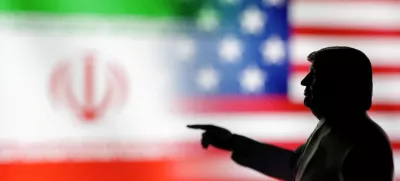 FILE PHOTO: A 3D-printed miniature model depicting U.S. President Donald Trump, Iranian and U.S. flags in this illustration taken, April 17, 2025. REUTERS/Dado Ruvic/Illustration/File Photo