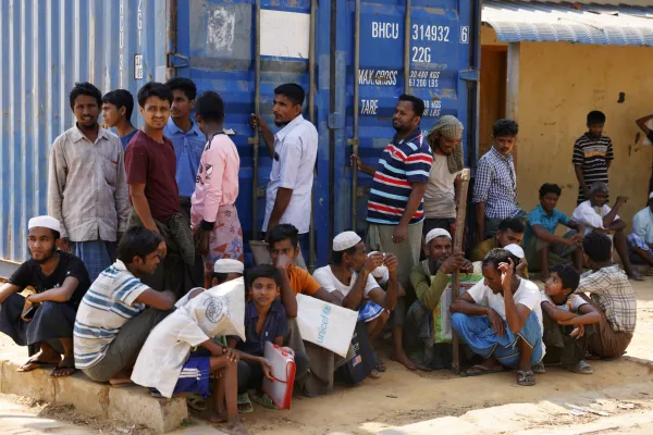 FILE PHOTO: Rohingya refugees wait for relief supplies during Ramadan, at the Rohingya refugee camp in Cox's Bazar, Bangladesh, March 16, 2025. REUTERS/Mohammad Ponir Hossain/File Photo