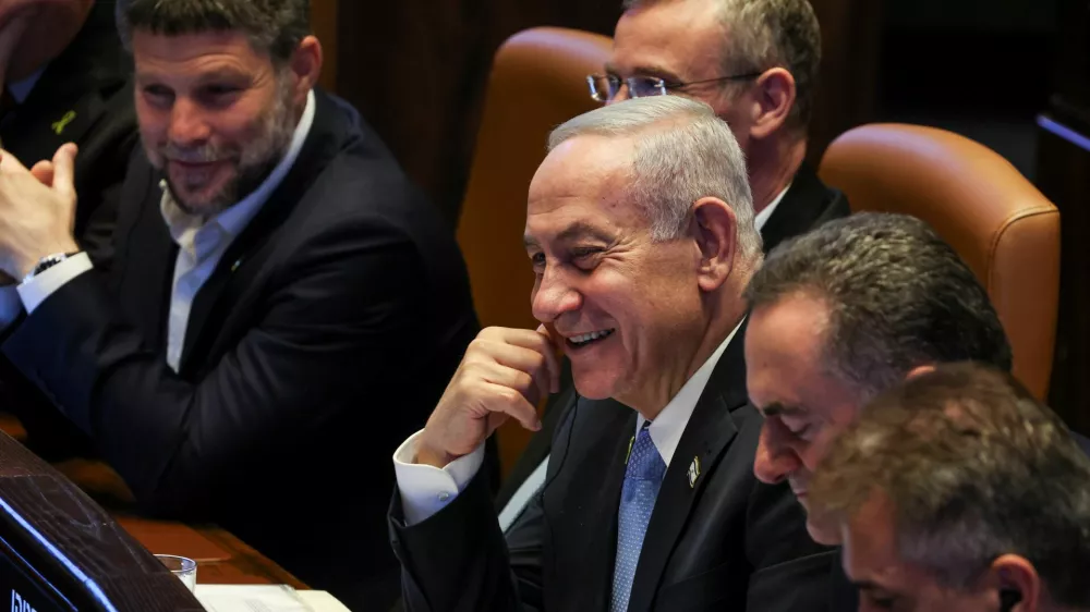 Israeli Prime Minister Benjamin Netanyahu, Foreign Minister Israel Katz and Israeli Finance Minister Bezalel Smotrich attend a Plenum session of the Knesset, Israel's Parliament, in Jerusalem, June 11, 2025 REUTERS/Ronen Zvulun
