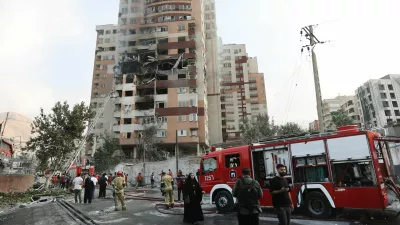 Firefighters work at the scene of a damaged building in the aftermath of Israeli strikes, in Tehran, Iran, June 13, 2025. Majid Asgaripour/WANA (West Asia News Agency) via REUTERS  ATTENTION EDITORS - THIS PICTURE WAS PROVIDED BY A THIRD PARTY   TPX IMAGES OF THE DAY