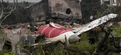 Parts of an Air India plane that crashed on Thursday are seen on top of a building in Ahmedabad, India, Friday, June 13, 2025. (AP Photo/Rafiq Maqbool)