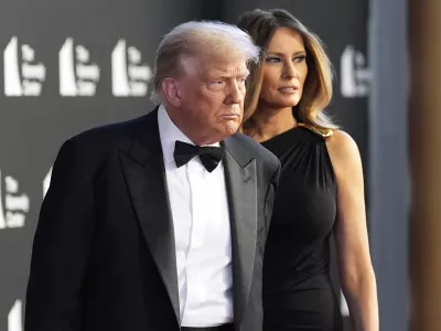 President Donald Trump and first lady Melania Trump arrive to view opening night of "Les Miserables," at the Kennedy Center, Wednesday, June 11, 2025, in Washington. (AP Photo/Alex Brandon)