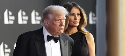 President Donald Trump and first lady Melania Trump arrive to view opening night of "Les Miserables," at the Kennedy Center, Wednesday, June 11, 2025, in Washington. (AP Photo/Alex Brandon)