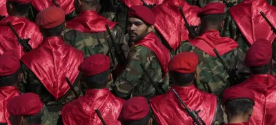 FILE - An Iranian army member looks back among others, as they conclude their march, during a parade commemorating National Army Day in front of the shrine of the late revolutionary founder Ayatollah Khomeini, just outside Tehran, Iran, Friday, April 18, 2025. (AP Photo/Vahid Salemi, File)