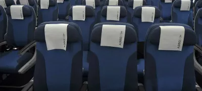 Rows of seats, installed on board of an Airbus A350 XWB flight-test aircraft, are pictured during a media-day at the German headquarters of aircraft company Airbus in Hamburg-Finkenwerder, April 7, 2014. European planemaker Airbus unveiled on Monday the first cabin for its new mid-sized twin-engined airliner, the A350 XWB, vowing to avoid a repeat of the delays caused by cabin design changes on its bigger A380 super jumbo. REUTERS/Fabian Bimmer (GERMANY - Tags: TRANSPORT TRAVEL)