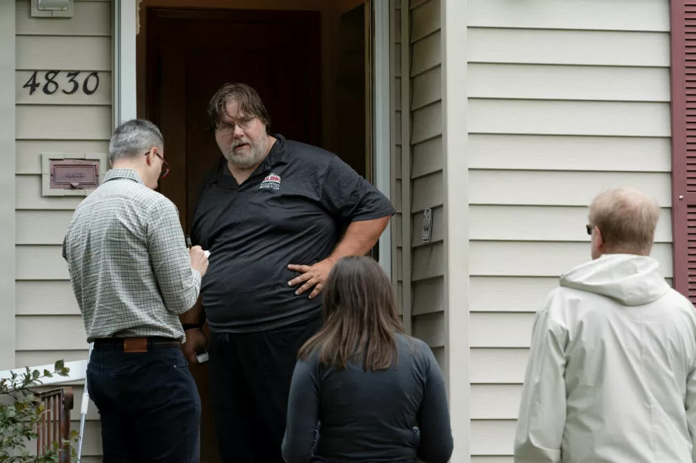 David Carlson, a roommate who lives at a residence associated with 57-year-old Vance Luther Boelter, primary suspect involved in the deaths of senior Democratic state assemblywoman Melissa Hortman and her husband, speaks with media at his home, in Minneapolis, Minnesota, U.S., June 14, 2025.  REUTERS/Tim Evans